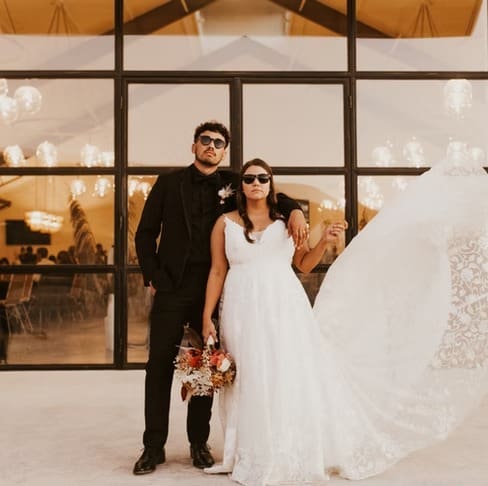 Bride and groom in sunglasses